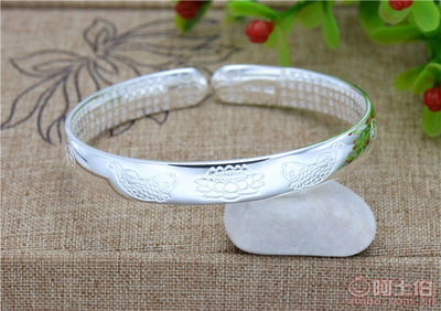 世禧首饰30克足银999.9手镯 双鱼戏莲花心经开口手环的工艺与特色
